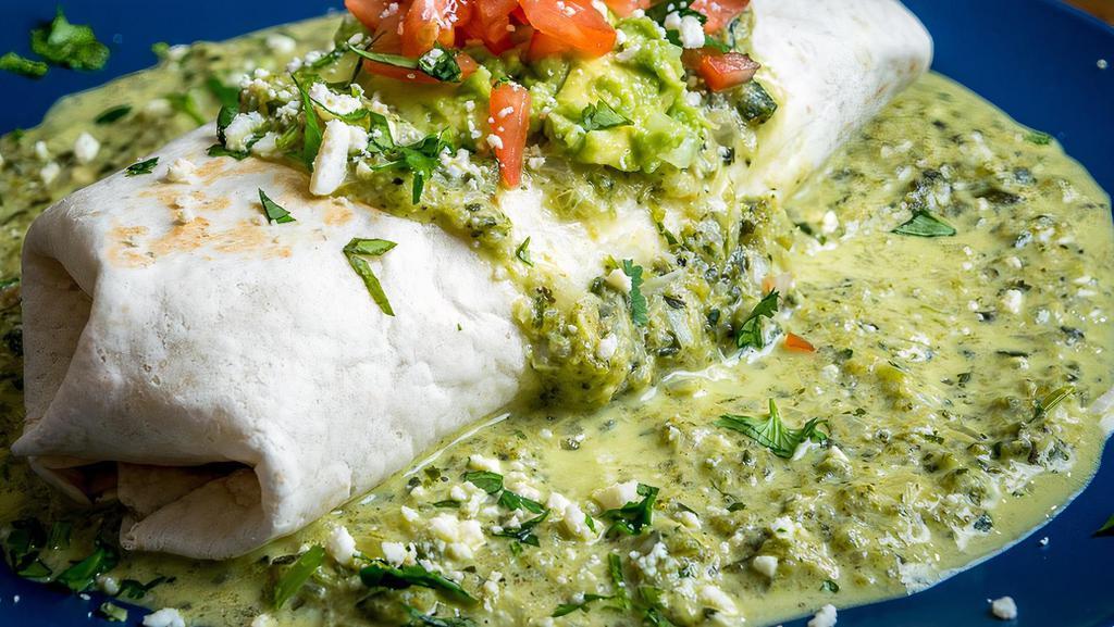 Poblano Burrito · Flour or Whole Wheat tortilla filled with your choice of meat, rice, beans, lettuce and sour cream With oaxaca cheese, chipotle and onions and side of guacamole on the side