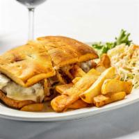 Filet Mignon Steak Sandwich
 · Filet mignon pounded thin and topped with melted mozzarella cheese and crispy fried onions.