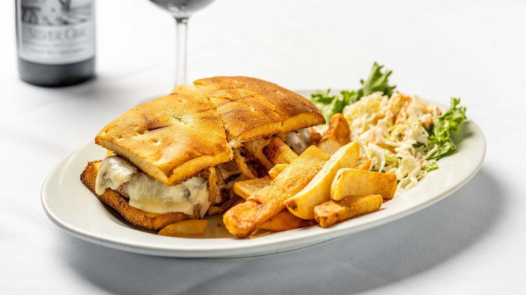 Filet Mignon Steak Sandwich
 · Filet mignon pounded thin and topped with melted mozzarella cheese and crispy fried onions.