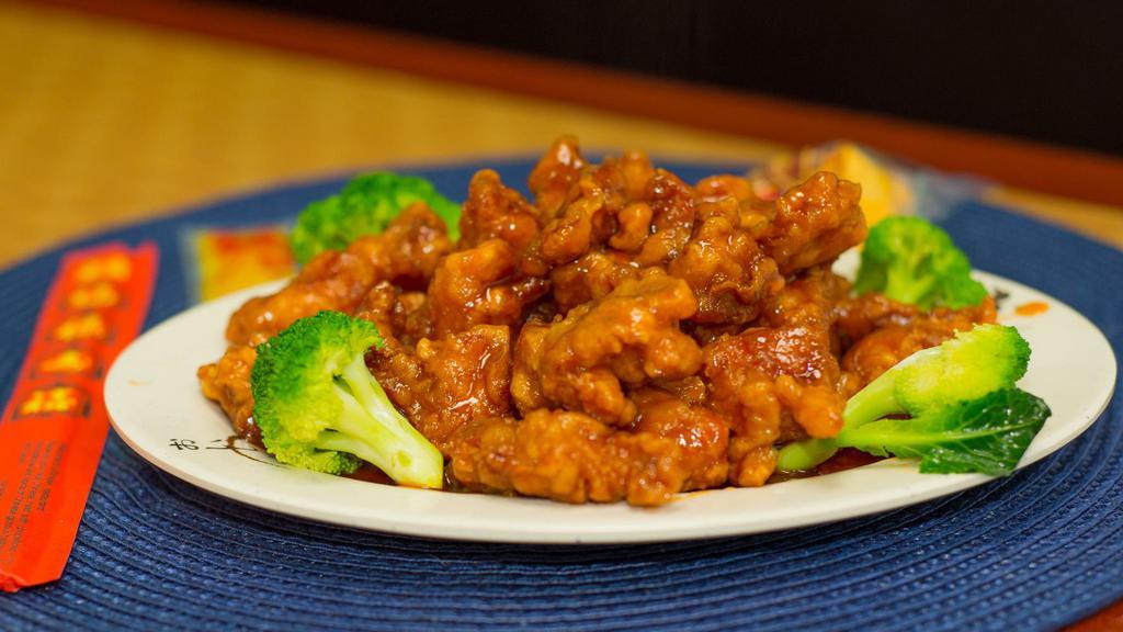 General Tso Chicken · Spicy. Served with egg roll and pork fried rice.