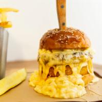 Mac & Cheese Burger · Panko crusted mac & cheese patty, beef patty, mac & cheese, sesame bun (make it truffle-baco...