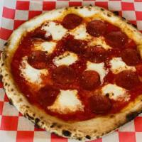 The Pepperoni Pizza · Tomato sauce, house-made mozzarella, Pepperoni