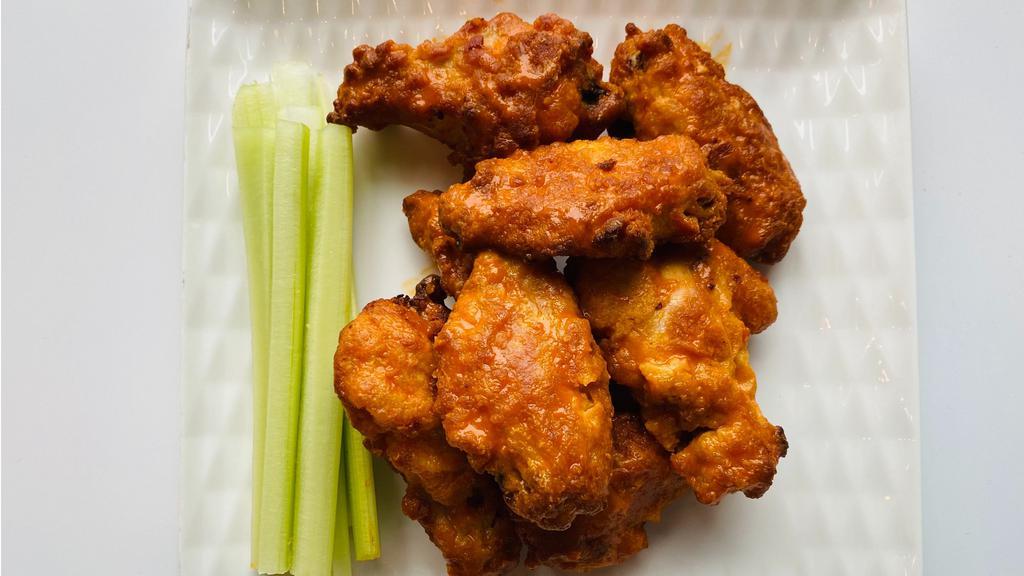 Chicken Wings · 10 chicken wings, mild or spicy