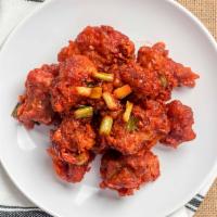 Lehsuni Gobhi · Crispy deep fried cauliflower tossed in tomato and garlic sauce.