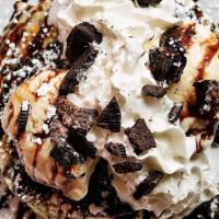 Oreo Cookie Pancakes · Buttermilks baked with oreo cookies inside and topped with oreo cookies, vanilla ice cream, ...