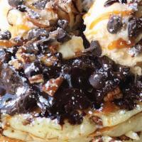 Brownie Sundae Pancakes · Our buttermilks baked with chocolate chips, topped with a warm fresh brownie, vanilla ice cr...