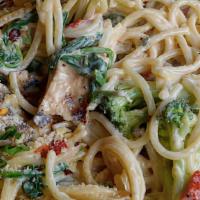 Rasta Pasta · Grilled chicken, broccoli, red pepper flakes, spinach, roasted red peppers and mushrooms ove...