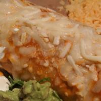 Burritos · Homemade flour tortilla, topped with our house burrito sauce and cheese. Filled with refried...