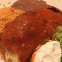 Chimichanga · Hand-rolled flour tortilla, stuffed with your choice of ground or shredded beef, pulled chic...