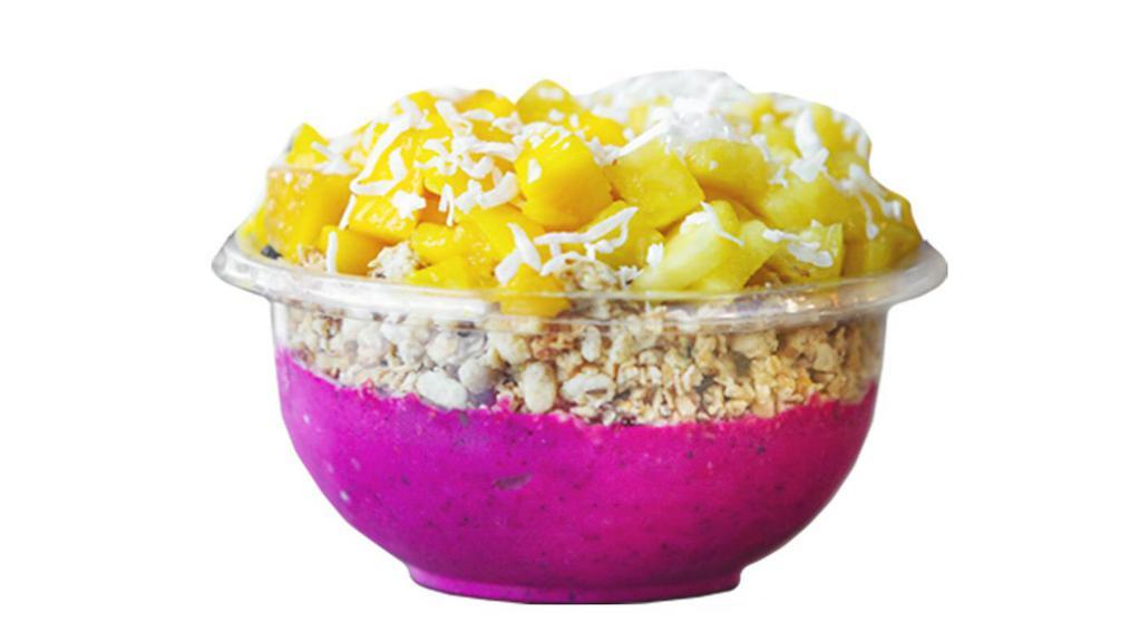 Barbados Bowl · All the best flavors in one place! Pitaya, banana, pineapple, almond milk makes the perfect base to be topped with granola, mango, pineapple and coconut flakes.