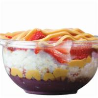 Power Bowl · Base: organic açaí with banana, peanut butter. Toppings are strawberry, peanut butter, oats,...