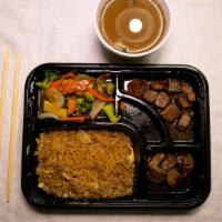 Filet Mignon Hibachi · Served with soup, green salad, shrimp appetizers, vegetables, fried rice, and noodles.
