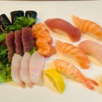 Sushi & Sashimi Combo · Five pieces of chef's choice sushi, nine pieces of assorted sashimi and one tuna roll. Serve...