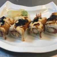 Lion King Roll · Spicy tuna, shrimp tempura and white tuna with black tobiko, eel sauce, and spicy mayo.