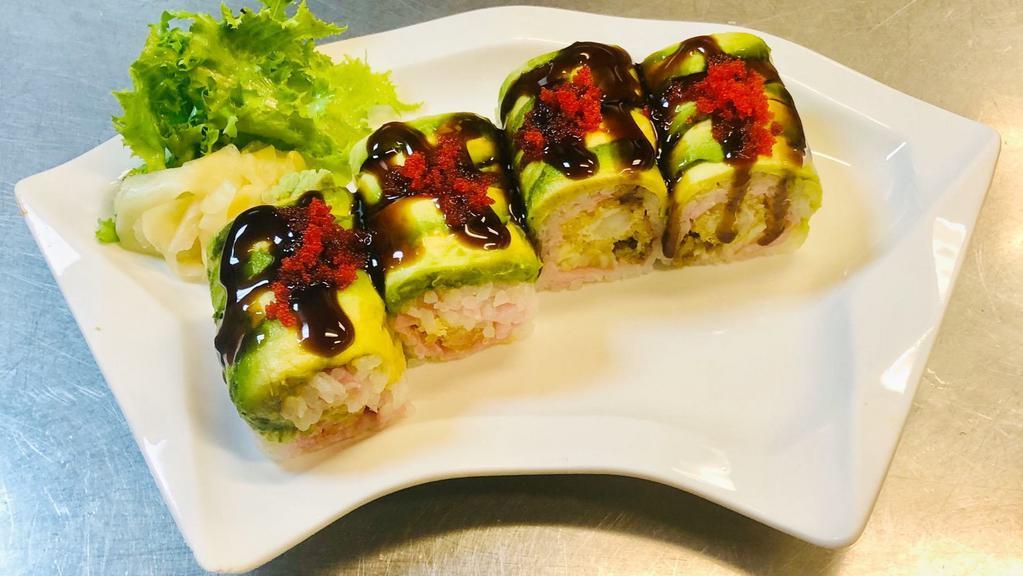 Kill Bill Roll · Shrimp tempura, fly oyster and cucumber with soybean paper and avocado on top and caviar, eel sauce and spicy mayo.