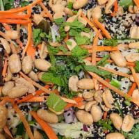 Veganese Salad · Mixed greens and kale tossed with apple, celery, house made thai peanut dressing. Topped wit...