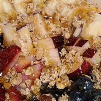 Acai Bowl · Acai blended with strawberries, blueberries, banana and apple juice. Topped with bananas, bl...