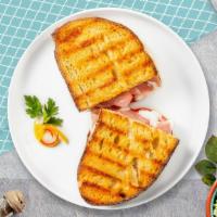 The Fowl Turk Turf Panini · Sliced turkey, melted cheese, and tomato on your choice of toasted bread.