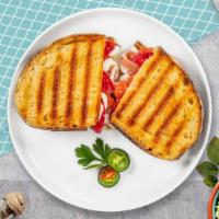 Bite Of Italy Panini · Grilled chicken, mozzarella cheese, roasted peppers and pesto sauce.