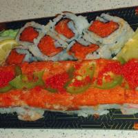 Spicy Lover Roll · Spicy. Spicy crunchy tuna topped with spicy crunchy salmon and wasabi caviar on top.
