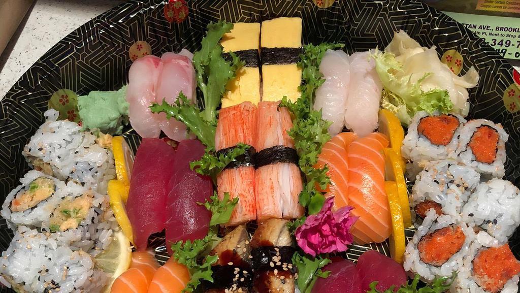 Party Platter 1 · Seven of any regular rolls and choice of shrimp tempura, tiffany or rainbow roll. Please choose the quantity of regular rolls you would like and enter number of each in the special instructions.