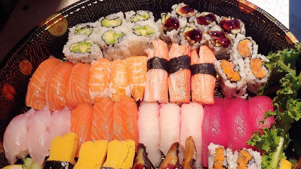 Party Platter 3 · Three regular rolls and 30 pieces of chef's choice assorted sushi or sashimi.