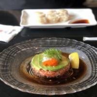 Tuna Tartar · Spicy tuna with crunch, scallion and caviar.