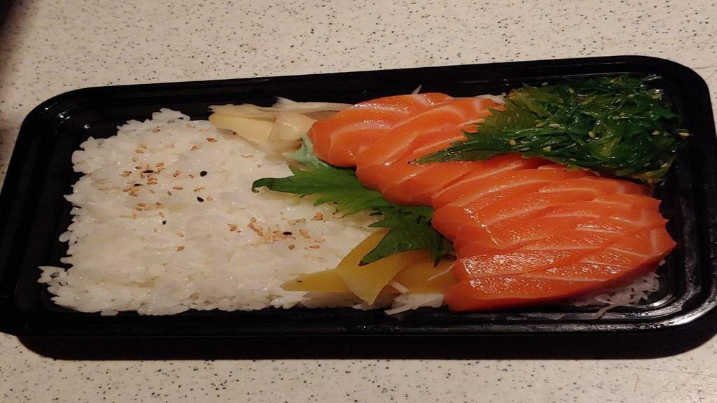 Sake Don · Raw salmon over rice. Includes soup or salad.
