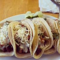 Tacos (3) · With onions, cilantro, tomato and guacamole. Choice of pork, chicken, chorizo, steak. / Con ...