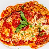 Chicken Parmigiana · A classic Italian chicken parmigiana. Served with pasta or vegetables.