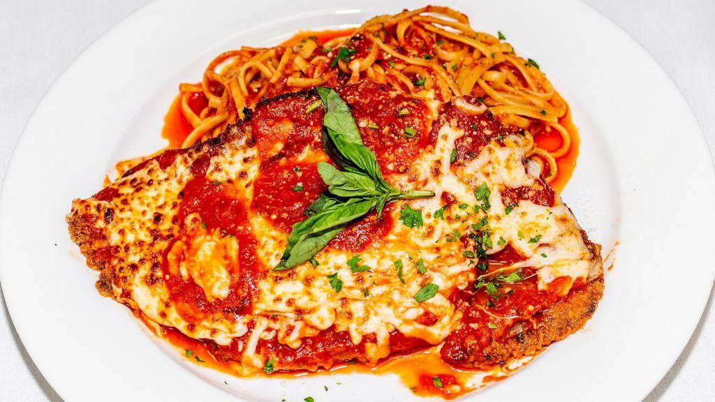 Chicken Parmigiana · A classic Italian chicken parmigiana. Served with pasta or vegetables.