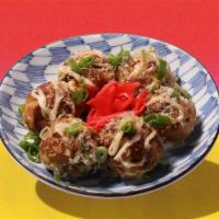 Takoyaki · Filled with octopus, pickled ginger, and green onion.