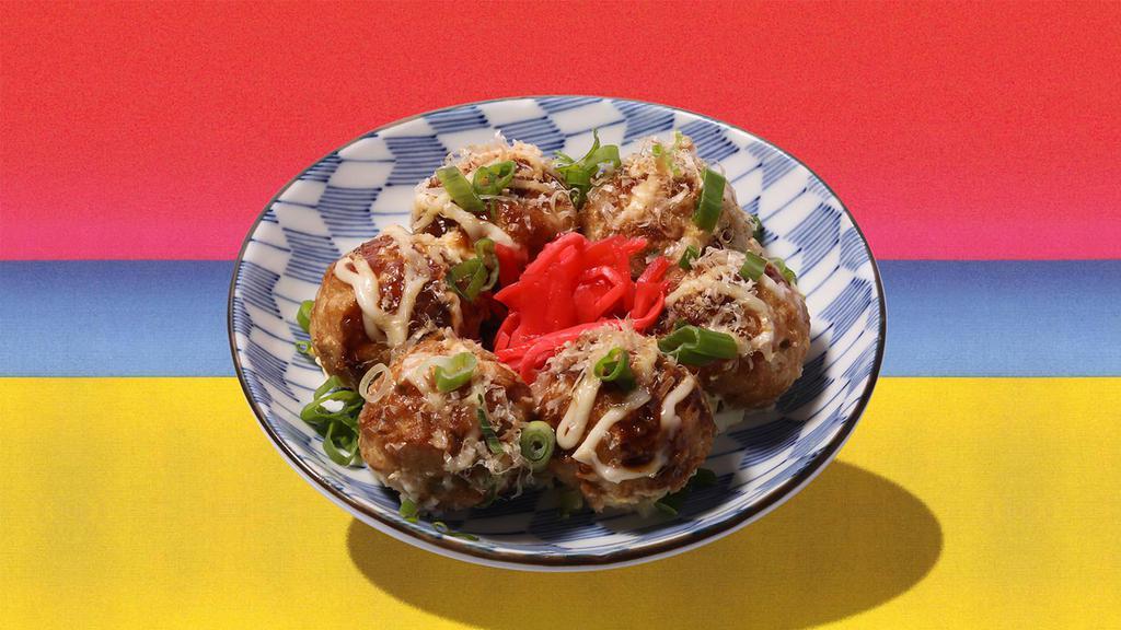 Takoyaki · Filled with octopus, pickled ginger, and green onion.