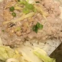 Baked Pork Rice · Authentic Hong Kong famous dishes. On top of fries rice, you have pork chop and homemade sau...