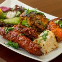 Combination Platter · Chicken malai kebab, chicken tikka and barrah kebab.