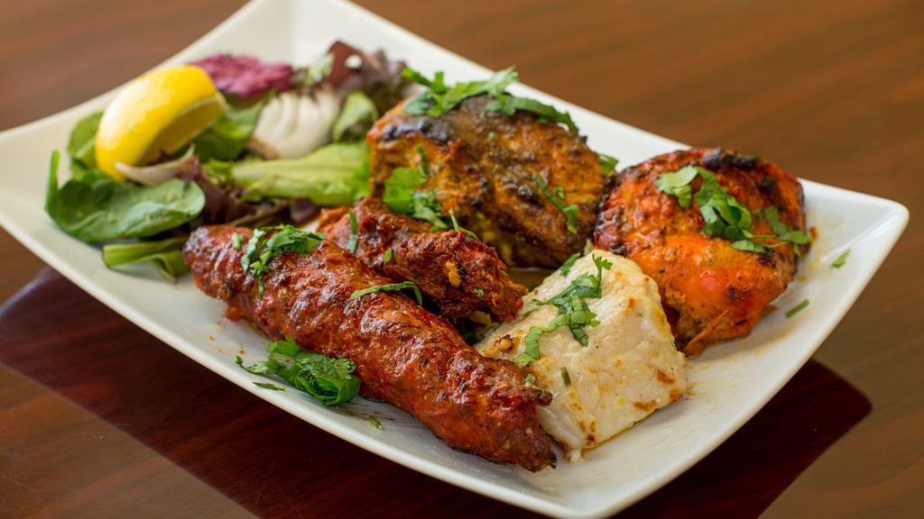 Combination Platter · Chicken malai kebab, chicken tikka and barrah kebab.