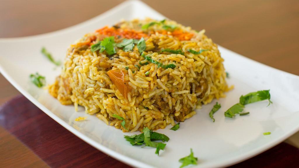 Lamb Biryani · Simmered in a blend of aromatic base of spices, rice, and lamb.