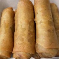 Spring Rolls · 6 pcs. Ground chicken, bean threads, carrot, onions & taro wrapped in wheat flour paper. Fry...