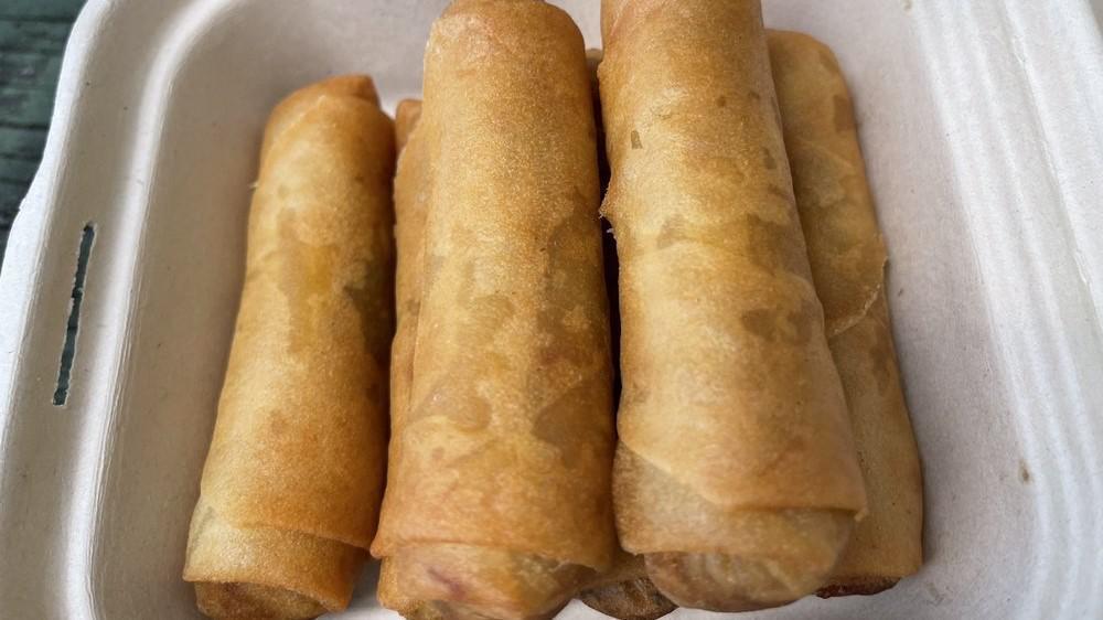 Spring Rolls · 6 pcs. Ground chicken, bean threads, carrot, onions & taro wrapped in wheat flour paper. Fry until crispy. Served w/lettuce,