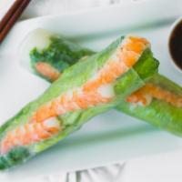 Summer Rolls · 2 pcs. shrimp, lettuce, mint leaves & rice-vermicelli wrapped in moist rice paper. Served w/...