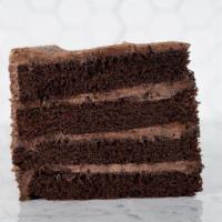 Cookies & Cream Cake Slice · Layers of chocolate cake filled and iced with cookies & cream mousse