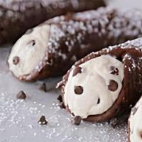 Chocolate-Dipped Cannoli · Crispy Italian shell dipped in chocolate and filled with sweet ricotta cheese, chocolate chi...