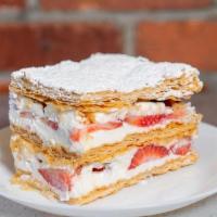 Strawberry Napoleon · Layers of mila foglia pastry filled with pure whipped cream and fresh strawberries, topped w...
