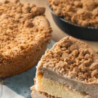 Crumb Cake Wedge · A Carlo's Bakery classic! Individual serving of pound cake topped with our signature cinnamo...