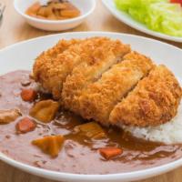 Chicken Katsu Curry · Panko battered chicken with served with curry, cabbage, and red pickles.