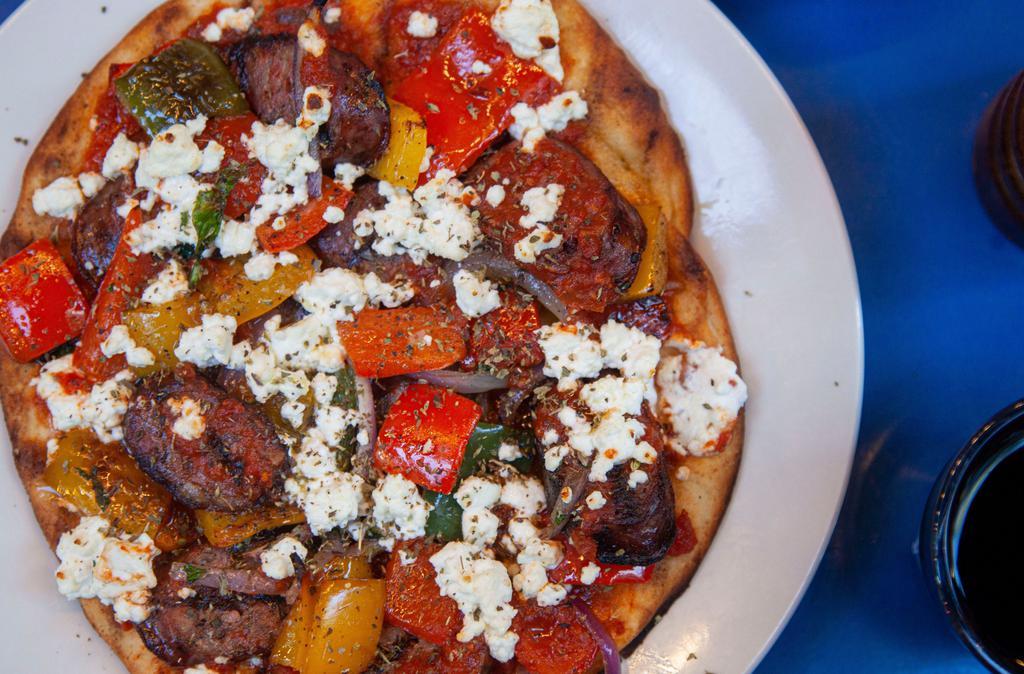 The Spetzofai Pitza  · Greek Pork Sausage With Colored Peppers & Onions In Homemade Tomato Sauce With Drizzled Feta Cheese