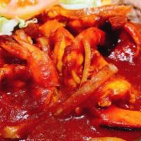 Camarones A La Diabla · Shrimp in chipotle spicy sauce.
