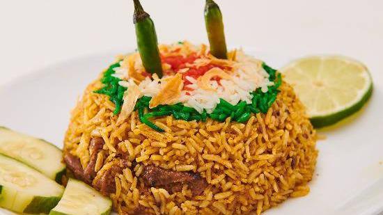 Biryani · Choice of meat cooked with Indian basmati rice and 20 exotic medium and mild spices.