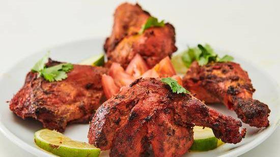 Half Chicken Tandoori · Lean spring chicken marinated in yogurt, ginger, garlic, herbs and mild spices, roasted in a clay oven and served with basmati rice. Complementary masala sauce on the side!.