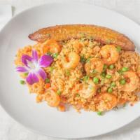 Arroz Con Camarones · Rice cooked in rich shrimp broth and mixed with seasoned shrimp sauteed onions, peppers, tom...